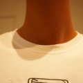 PUPULA（ププラ）パフュームボトルモチーフTシャツ