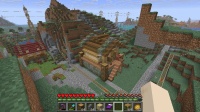 樹皮を剥いだ丸太小屋を作る
