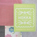 『缶がかわいい〜HOKKA米蜜ビスケットピスタチオ』の画像