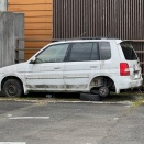 とあるスーパーの放置車、マツダ デミオ