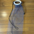 釣ったタコを入れる網