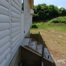 ネコ村住宅　６月11日　簡易水洗トイレ納品　システムバスは１６日設置