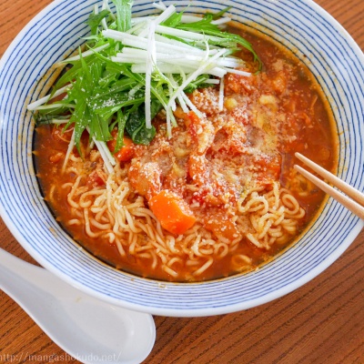 極食キング」（土山しげる）のトマトキムチ炒め卵黄のせドンブリ