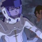 【悲報】ガンダム閃ハサのレーンさん、テロリストに人質を取った事を煽られ素直に人質を解放してしまう…（画像あり）