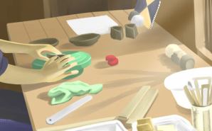 工房にて"作陶作業中"の妻の絵