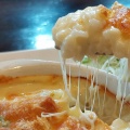 素材の味わいと風味を存分に楽しめることのできるグラタン：殻付き帆立貝のイタリア風グラタン