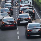 『撤退から9年「Uber」マカオに再進出、港澳越境専用車も』の画像