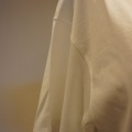 PUPULA（ププラ）パフュームボトルモチーフTシャツ